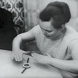 Above and below: stills from films of Kulagina performing psychokinetic feats